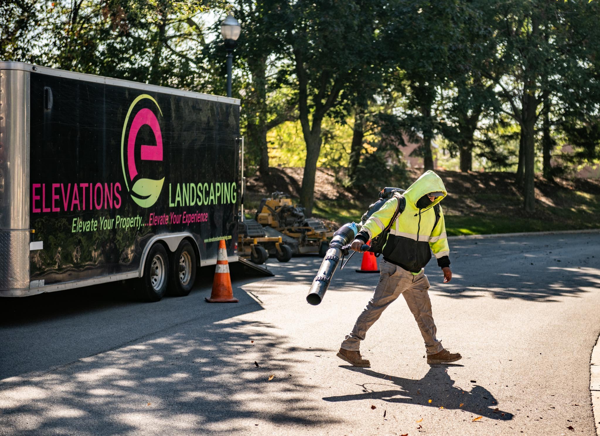 leaf blowing, landscape maintenance truck, clean property